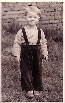 Jim, age 4, with corduroy dungarees on